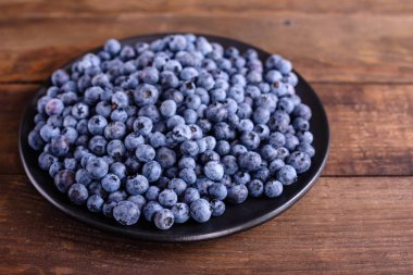 Sağlıklı beslenme ve beslenme için bir kase kavramı yaban mersini antioksidan organik gıda