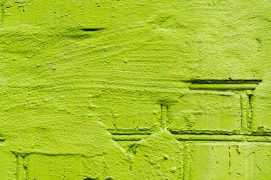 Çatlakları ve çizikleri olan tuğla duvar dokusu arka plan olarak kullanılabilir.