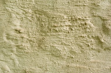 Çatlakları ve çizikleri olan beton bir duvarın dokusu arka plan olarak kullanılabilir.