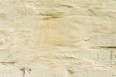 Çatlakları ve çizikleri olan beton bir duvarın dokusu arka plan olarak kullanılabilir.