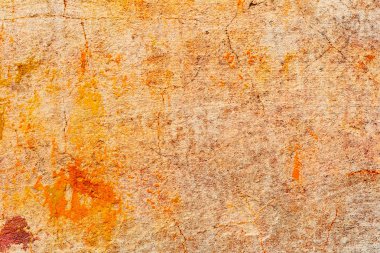 Çatlakları ve çizikleri olan beton bir duvarın dokusu arka plan olarak kullanılabilir.