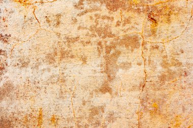 Çatlakları ve çizikleri olan beton bir duvarın dokusu arka plan olarak kullanılabilir.