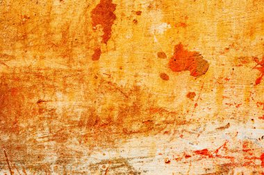 Çatlakları ve çizikleri olan beton bir duvarın dokusu arka plan olarak kullanılabilir.