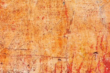 Çatlakları ve çizikleri olan beton bir duvarın dokusu arka plan olarak kullanılabilir.