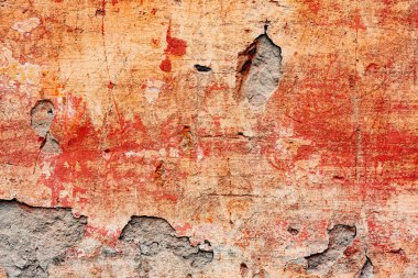 Çatlakları ve çizikleri olan beton bir duvarın dokusu arka plan olarak kullanılabilir.