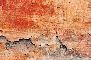 Çatlakları ve çizikleri olan beton bir duvarın dokusu arka plan olarak kullanılabilir.