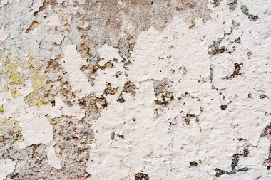 Çatlakları ve çizikleri olan beton bir duvarın dokusu arka plan olarak kullanılabilir.