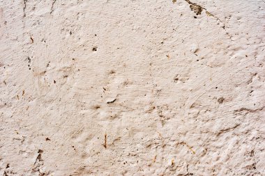 Çatlakları ve çizikleri olan beton bir duvarın dokusu arka plan olarak kullanılabilir.