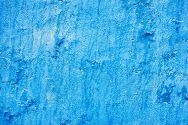 Çatlakları ve çizikleri olan beton bir duvarın dokusu arka plan olarak kullanılabilir.