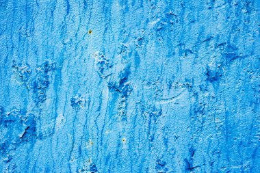 Çatlakları ve çizikleri olan beton bir duvarın dokusu arka plan olarak kullanılabilir.