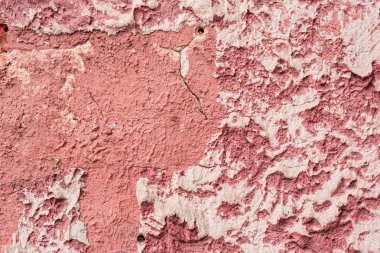 Çatlakları ve çizikleri olan beton bir duvarın dokusu arka plan olarak kullanılabilir.