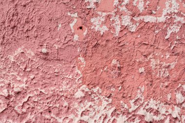 Çatlakları ve çizikleri olan beton bir duvarın dokusu arka plan olarak kullanılabilir.