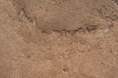 Çatlakları ve çizikleri olan beton bir duvarın dokusu arka plan olarak kullanılabilir.