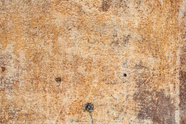 Çatlakları ve çizikleri olan beton bir duvarın dokusu arka plan olarak kullanılabilir.