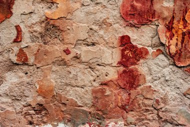 Çatlakları ve çizikleri olan beton bir duvarın dokusu arka plan olarak kullanılabilir.