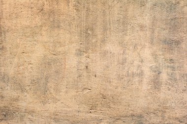 Çatlakları ve çizikleri olan beton bir duvarın dokusu arka plan olarak kullanılabilir.