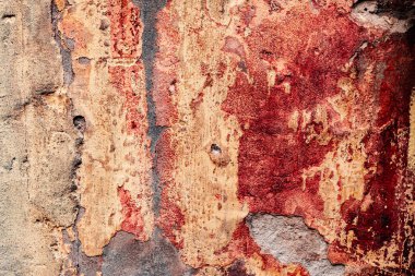 Çatlakları ve çizikleri olan beton bir duvarın dokusu arka plan olarak kullanılabilir.