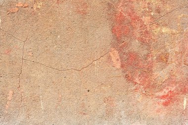 Çatlakları ve çizikleri olan beton bir duvarın dokusu arka plan olarak kullanılabilir.