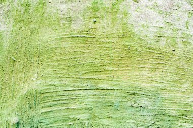 Çatlakları ve çizikleri olan beton bir duvarın dokusu arka plan olarak kullanılabilir.