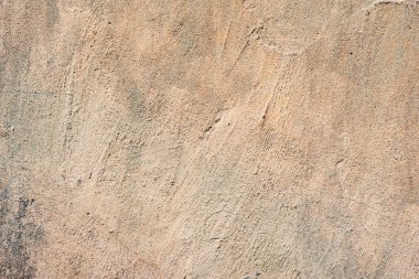 Çatlakları ve çizikleri olan beton bir duvarın dokusu arka plan olarak kullanılabilir.