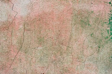 Çatlakları ve çizikleri olan beton bir duvarın dokusu arka plan olarak kullanılabilir.