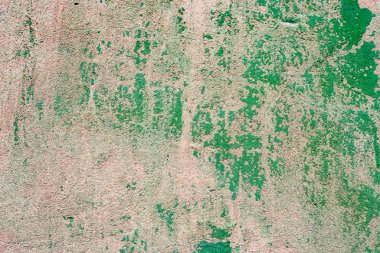 Çatlakları ve çizikleri olan beton bir duvarın dokusu arka plan olarak kullanılabilir.