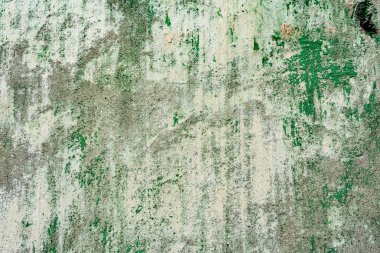 Çatlakları ve çizikleri olan beton bir duvarın dokusu arka plan olarak kullanılabilir.