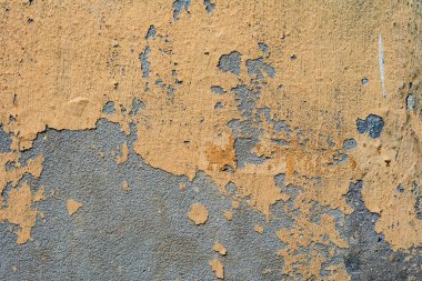 Çatlakları ve çizikleri olan beton bir duvarın dokusu arka plan olarak kullanılabilir.