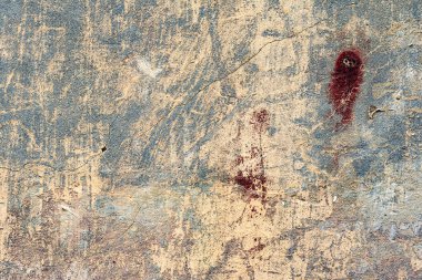 Çatlakları ve çizikleri olan beton bir duvarın dokusu arka plan olarak kullanılabilir.