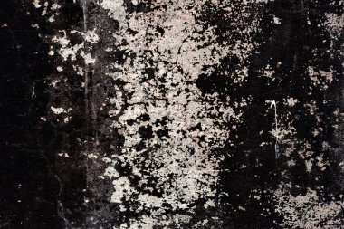 Çatlakları ve çizikleri olan beton bir duvarın dokusu arka plan olarak kullanılabilir.