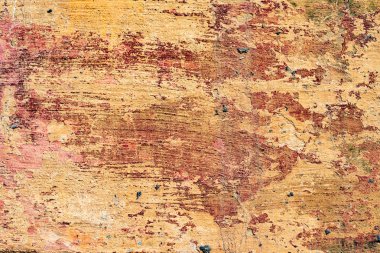 Çatlakları ve çizikleri olan beton bir duvarın dokusu arka plan olarak kullanılabilir.