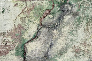 Çatlakları ve çizikleri olan beton bir duvarın dokusu arka plan olarak kullanılabilir.