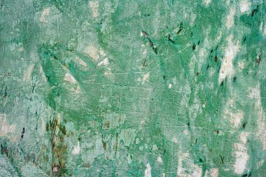 Çatlakları ve çizikleri olan beton bir duvarın dokusu arka plan olarak kullanılabilir.