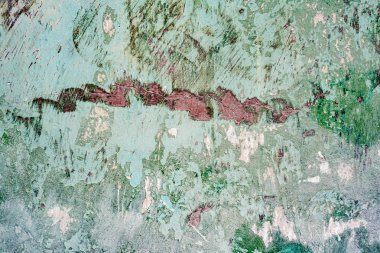 Çatlakları ve çizikleri olan beton bir duvarın dokusu arka plan olarak kullanılabilir.