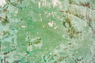 Çatlakları ve çizikleri olan beton bir duvarın dokusu arka plan olarak kullanılabilir.