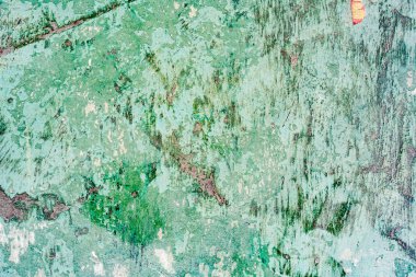 Çatlakları ve çizikleri olan beton bir duvarın dokusu arka plan olarak kullanılabilir.