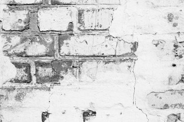 Çatlakları ve çizikleri olan tuğla duvar dokusu arka plan olarak kullanılabilir.