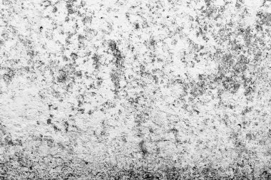 Çatlakları ve çizikleri olan beton bir duvarın dokusu arka plan olarak kullanılabilir.