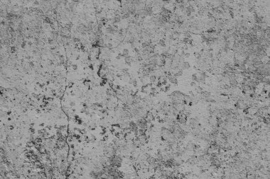 Çatlakları ve çizikleri olan beton bir duvarın dokusu arka plan olarak kullanılabilir.