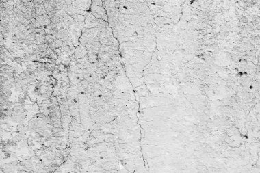 Çatlakları ve çizikleri olan beton bir duvarın dokusu arka plan olarak kullanılabilir.