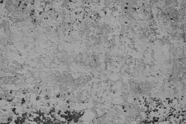 Çatlakları ve çizikleri olan beton bir duvarın dokusu arka plan olarak kullanılabilir.