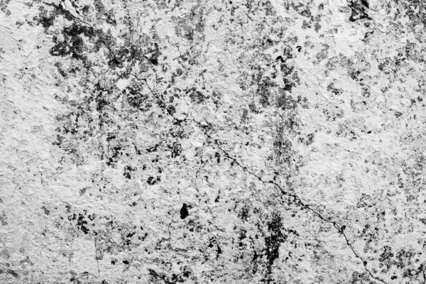 Çatlakları ve çizikleri olan beton bir duvarın dokusu arka plan olarak kullanılabilir.