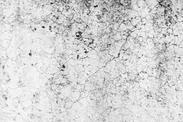 Çatlakları ve çizikleri olan beton bir duvarın dokusu arka plan olarak kullanılabilir.