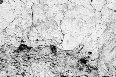 Çatlakları ve çizikleri olan beton bir duvarın dokusu arka plan olarak kullanılabilir.