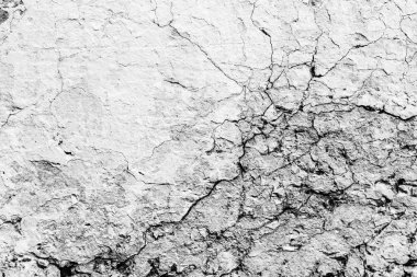 Çatlakları ve çizikleri olan beton bir duvarın dokusu arka plan olarak kullanılabilir.
