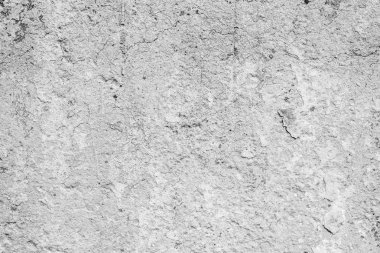 Çatlakları ve çizikleri olan beton bir duvarın dokusu arka plan olarak kullanılabilir.