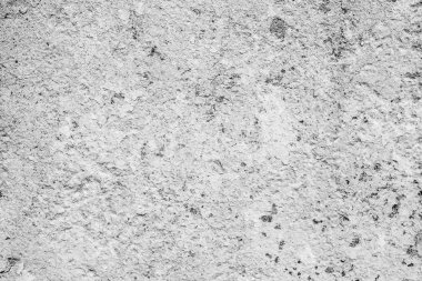 Çatlakları ve çizikleri olan beton bir duvarın dokusu arka plan olarak kullanılabilir.