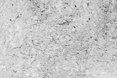 Çatlakları ve çizikleri olan beton bir duvarın dokusu arka plan olarak kullanılabilir.