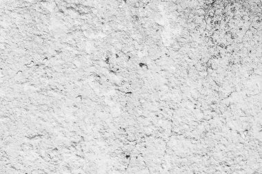 Çatlakları ve çizikleri olan beton bir duvarın dokusu arka plan olarak kullanılabilir.
