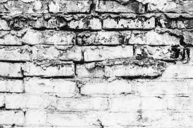 Çatlakları ve çizikleri olan tuğla duvar dokusu arka plan olarak kullanılabilir.